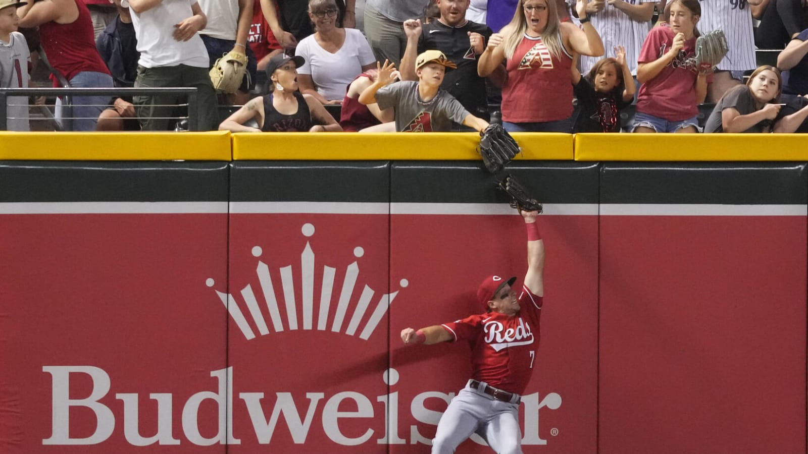 Watch: Young fan ejected after interfering with potential home run ball