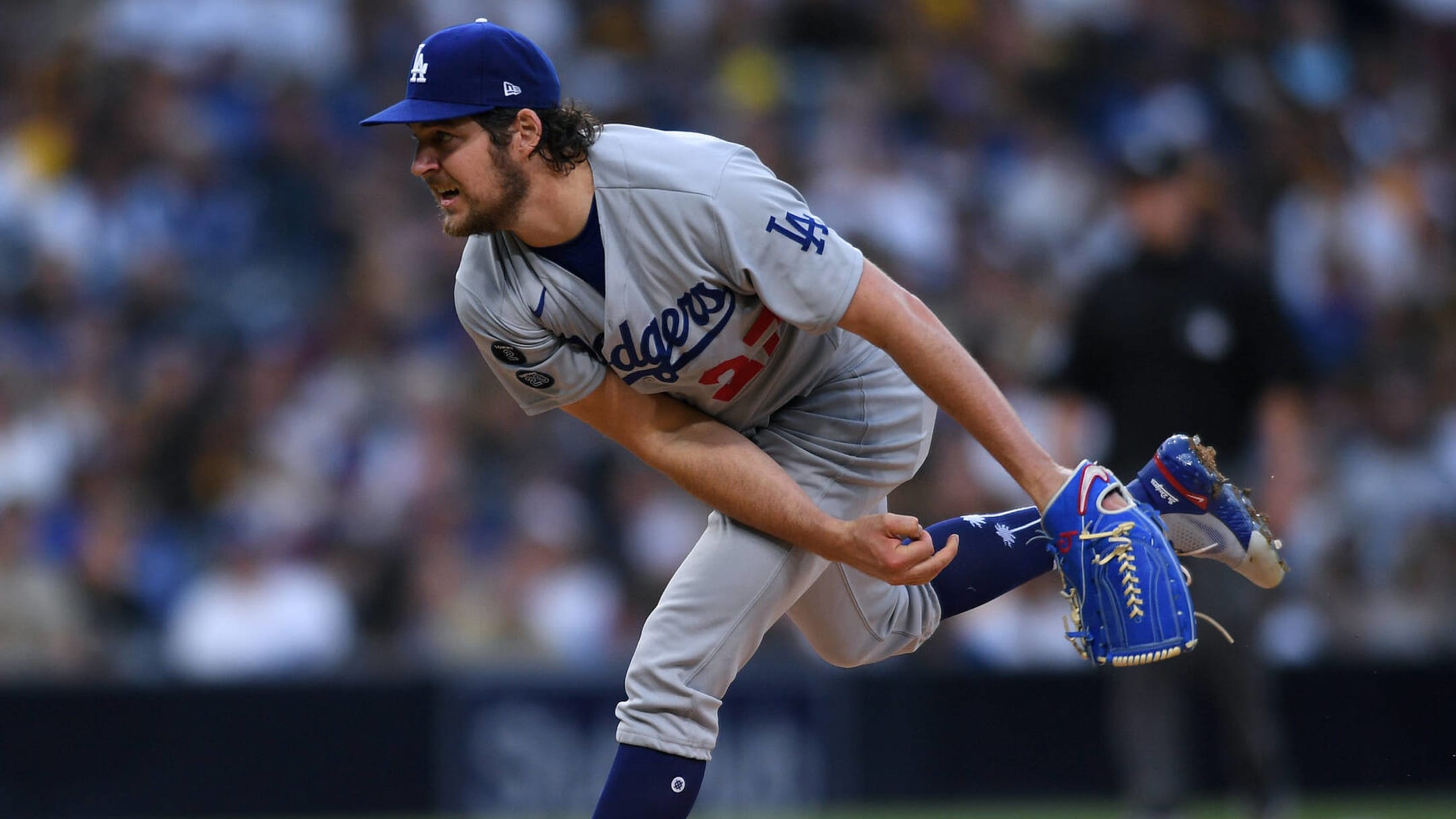 Dodgers pitcher Trevor Bauer reinstated after arbitrator reduces his  suspension