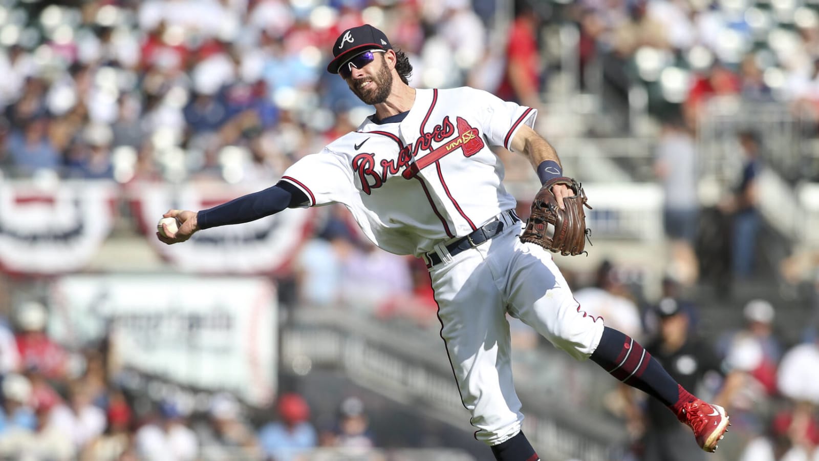 Atlanta Braves shortstop Dansby Swanson (7) throws the ball during