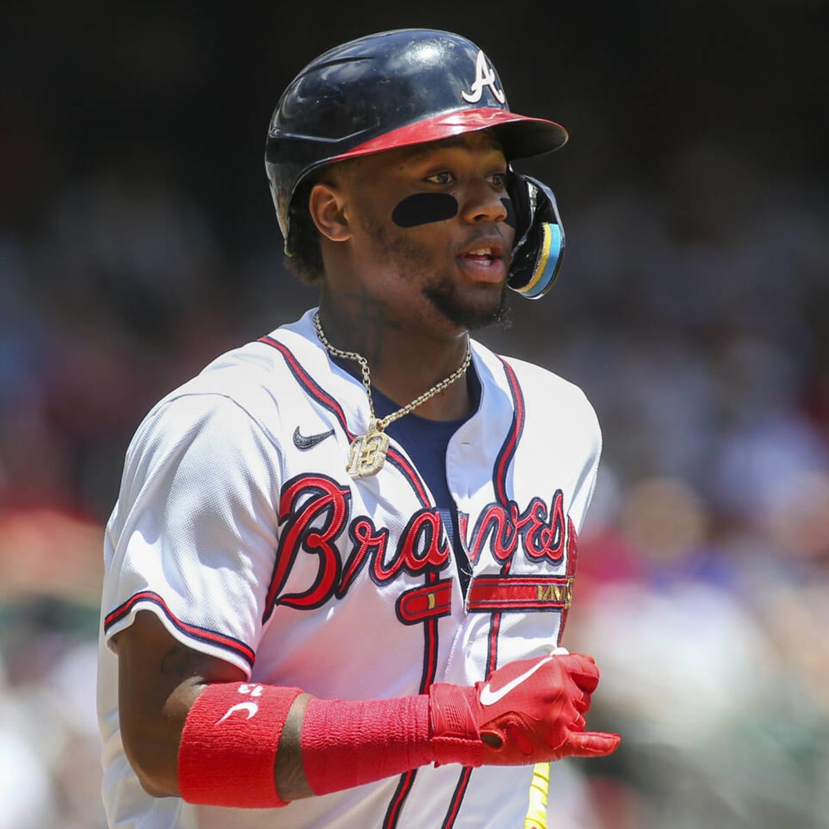 Photos: Smiling and sliding! Braves' Ronald Acuna Jr. slides in