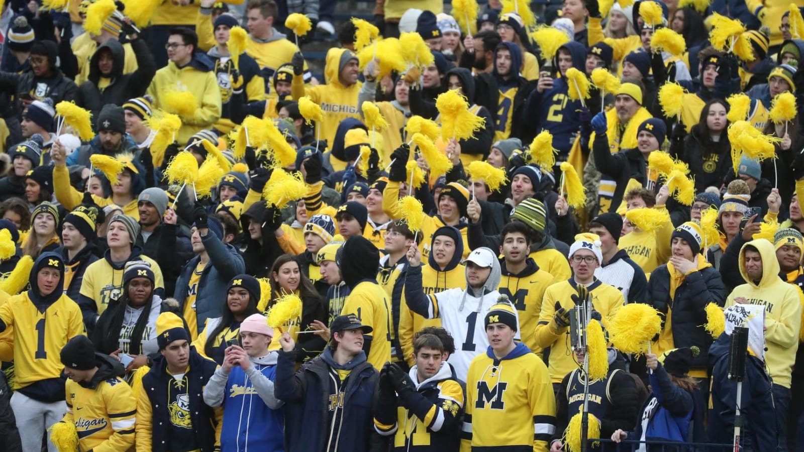 Michigan fans storm the field after beating Ohio State