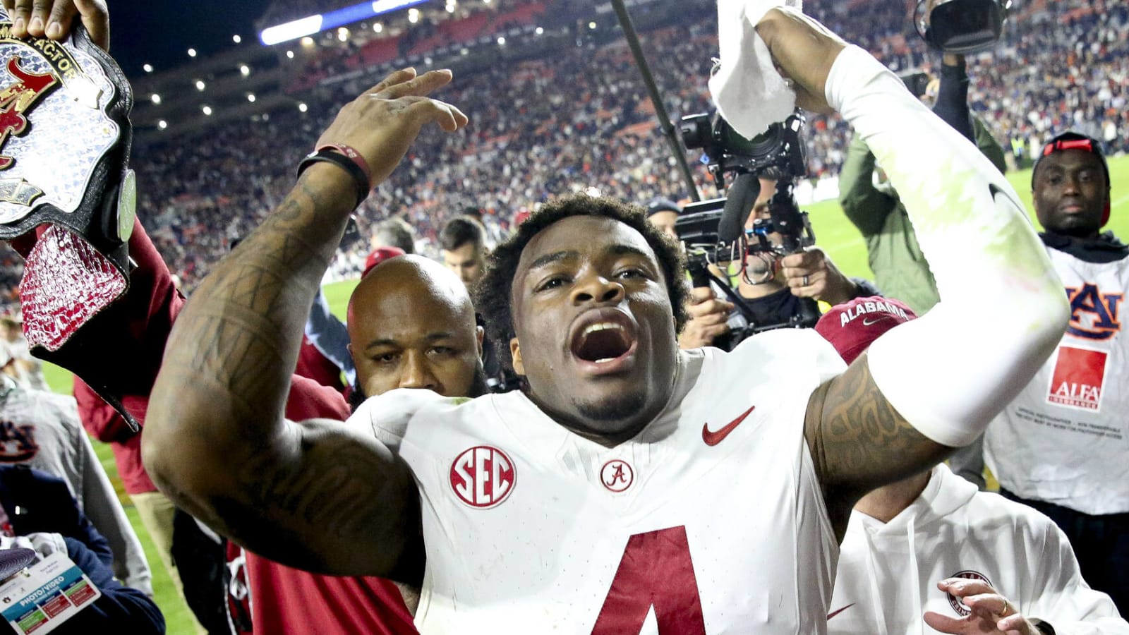 Watch: Alabama keeps CFP hopes alive with miracle TD