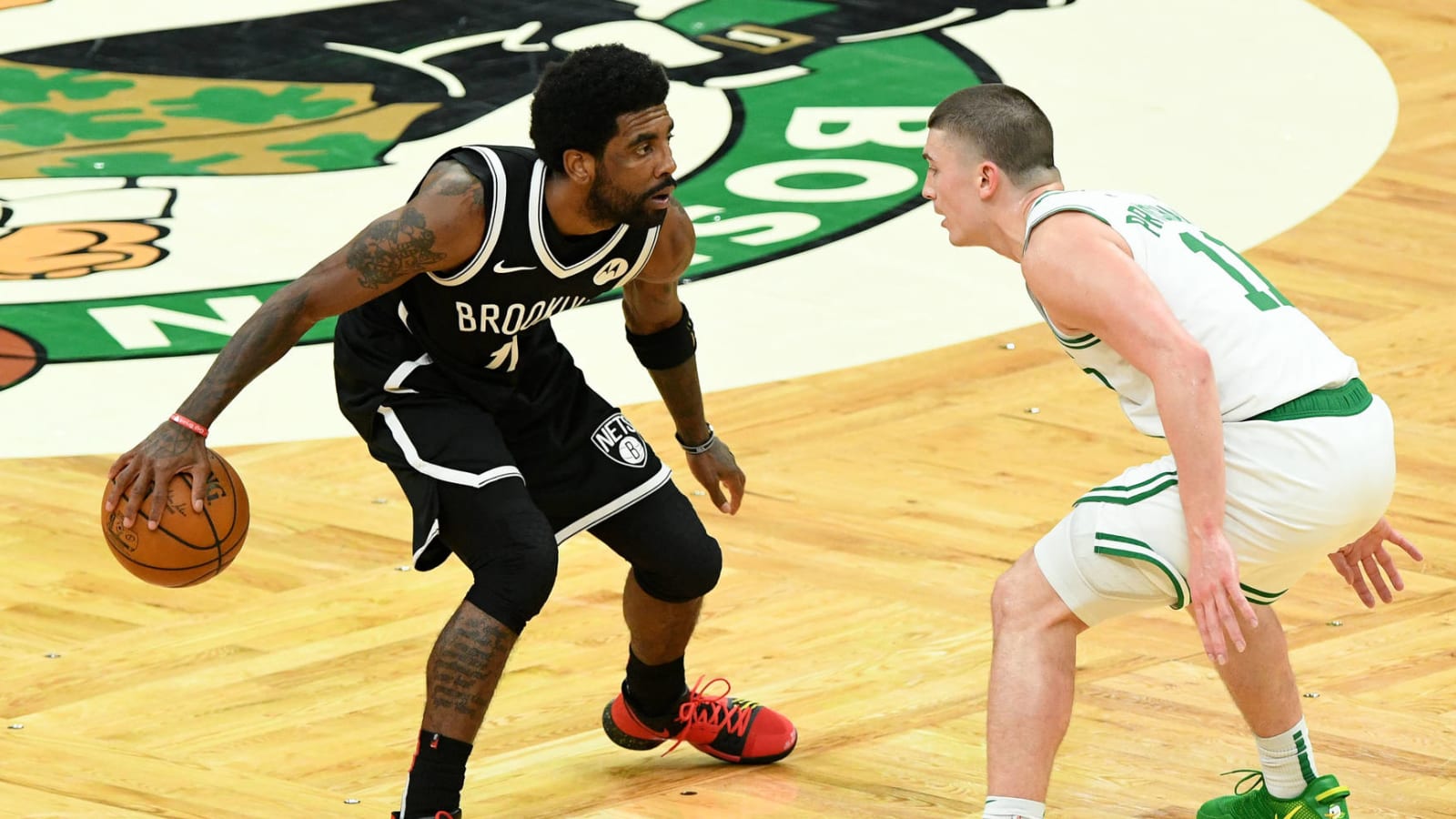 Watch: Celtics fan throws water bottle at Kyrie Irving following Game 4