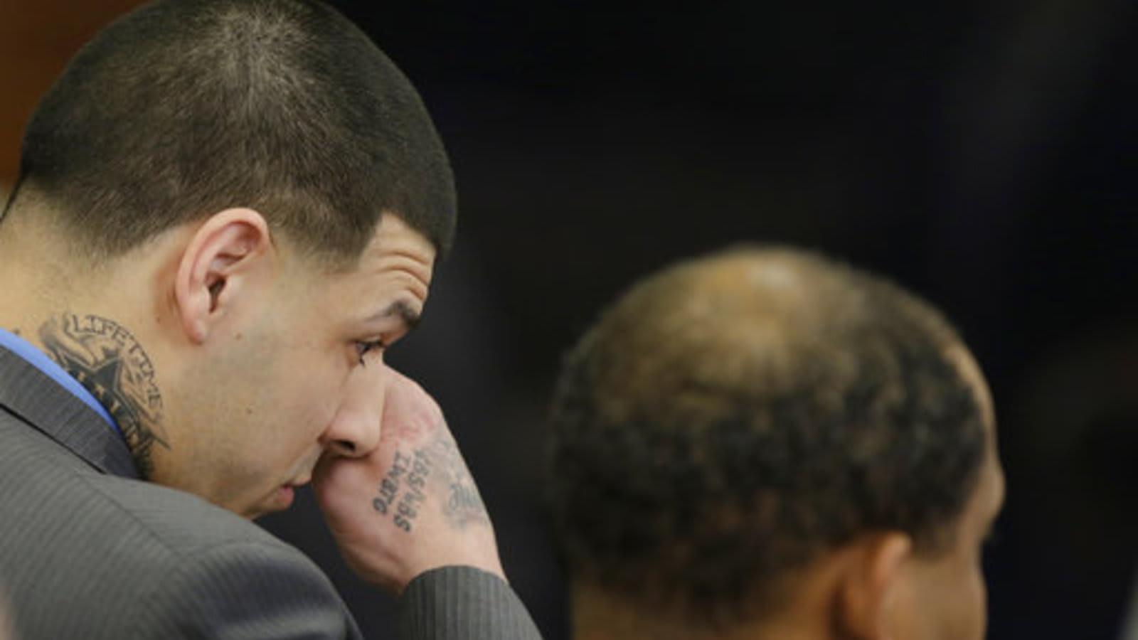 Aaron Hernandez cries after being found not guilty of murders