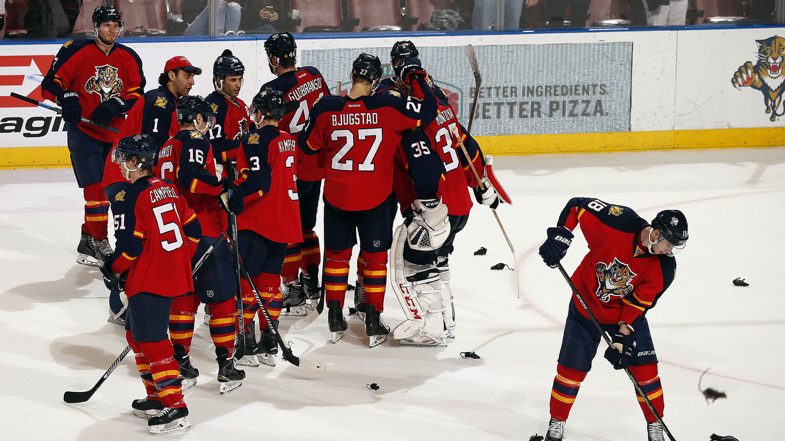 Where does the NHL draw the line with debris on the ice?