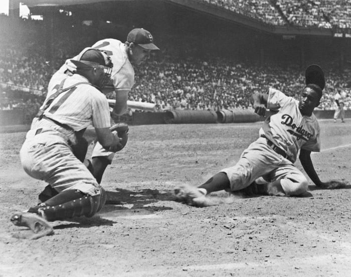 1947: First African-American MLB player (modern): Jackie Robinson
