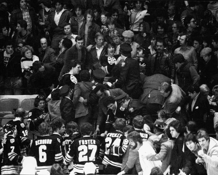 1979: Mike Milbury, Bruins fight Rangers fans in stands