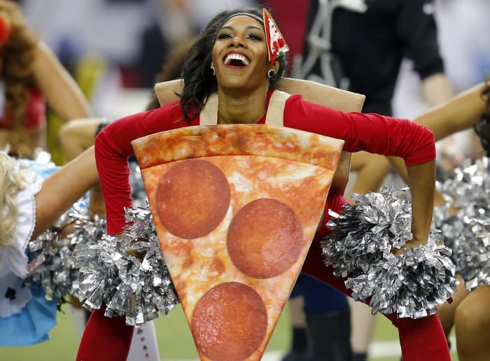 Cheerleader as a slice of pizza