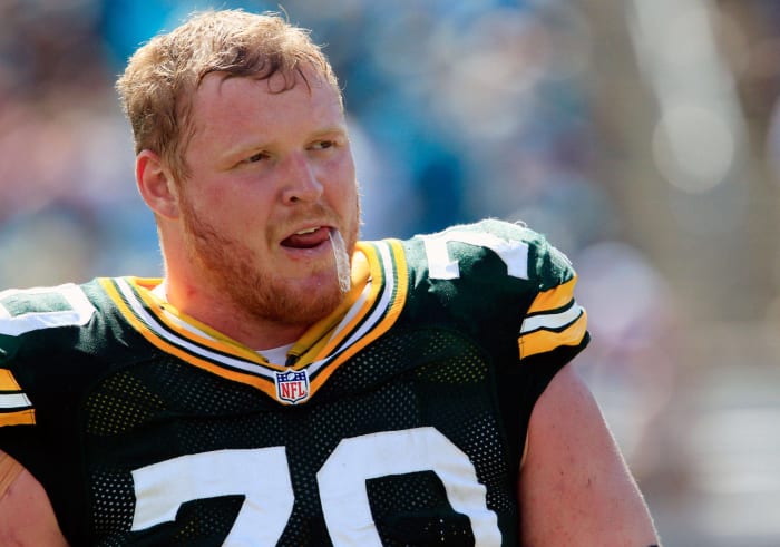 Best: Lions sign T.J. Lang