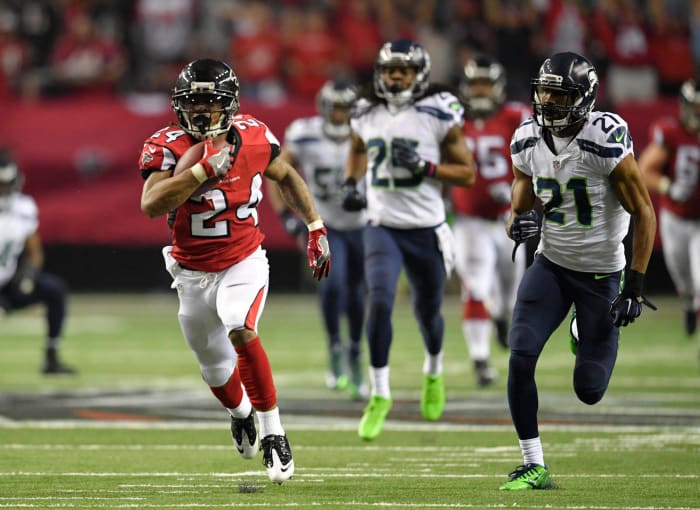 Who will record the most rushing yards in the game?