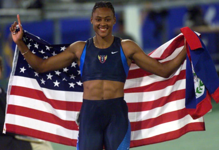 2000: Marion Jones forfeits Olympic medals