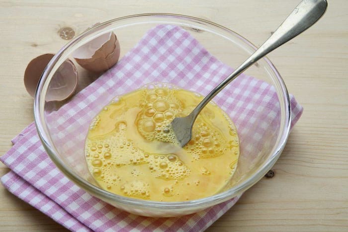 Use a fork to remove shell shards from the bowl