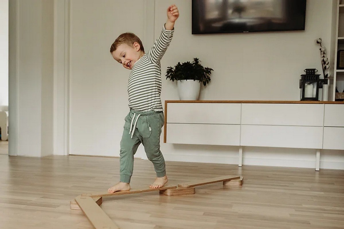 This article explores the use of balance beams in Montessori education. While not exclusive to the Montessori approach, balance beams are used to promote physical, cognitive, and social development in young children. By using balance beams, children develop their balance, coordination, concentration, problem-solving, and social skills, while also gaining confidence and independence in their physical abilities.