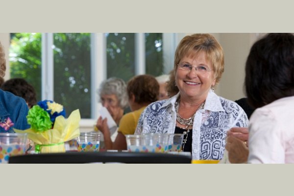 Meadowmere Southport Assisted Living  thumb_activities-09-woman-at-table