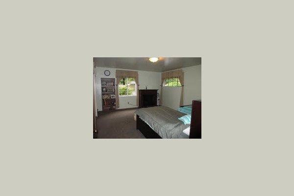 Large suite with on-suite bathroom and front patio access. 