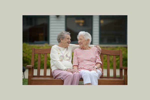 Crosby Commons at Wesley Village ladies on bench