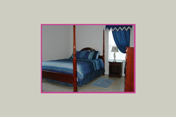 Beautifully decorated spacious bedroom. 