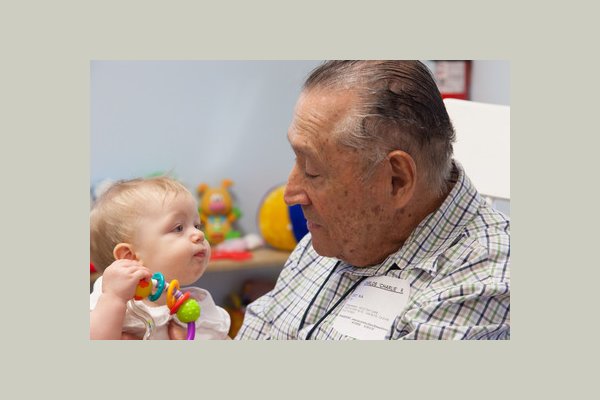 Intergenerational programs take place throughout the program day with children from six weeks old to six years old.