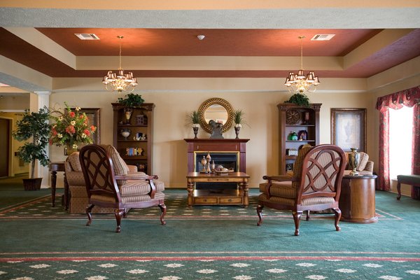 The living room in our Assisted Living is where the residents gather before going out on our trips. We also have a mobile library that sets up here for our residents to check out books and other media.
