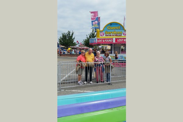 Our Life Enrichment Director and Director of Health Services with two of our residents at the State Fair