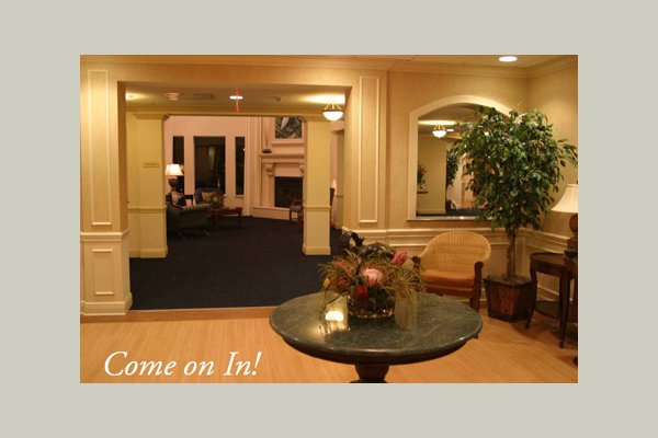 Concierge services every day.  This lobby opens to our main Living Room area, with fireplace and media center where we have many activities throughout the week.