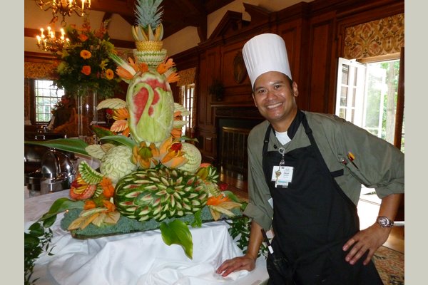 Sous Chef Oscar Lacson takes great pride in the creation of many elaborate and picture-perfect fruit sculptures that highlight K-B's dining experiences.