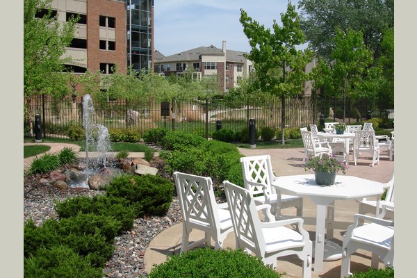 The Pines has a beautiful backyard patio area nestled next to the Richfield Sculpture Garden.