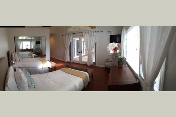 Choose from private or semi-private (shared) room options. Each bedroom features designer french doors that open directly to the patio.