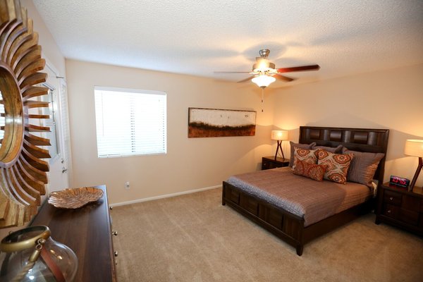 Master Bedroom is large and offers a lot of natural sunlight with a window and a door leading to your private balcony/patio
