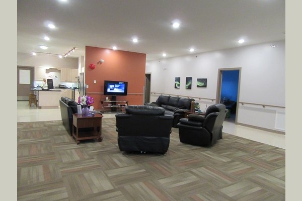 Here we have our big screen TV and very comfortable seating area. Families love to come and sit with their loved one and the grandchildren just love it