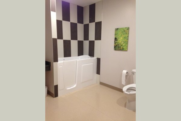 For those who like to soak in a bath once in a while, we offer our tub room. It has a walk-in whirlpool tub and is sure to make those aches and pains feel better
