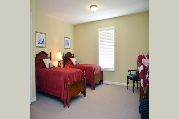 Suites have an extra closet and separate sitting area.