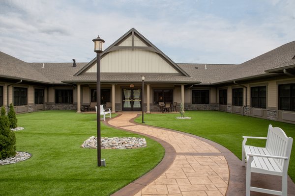 A beautiful, secured courtyard provides a safe and enjoyable outdoor area for residents with memory challenges to enjoy a stroll or simply sit and read a book.
