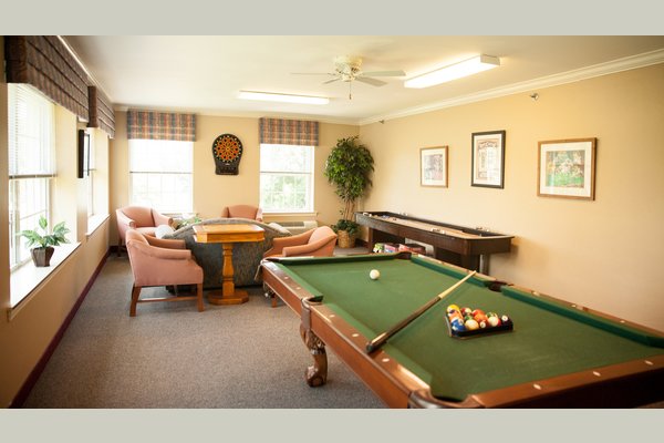 Billiards, shuffleboard and board games are just a few of the many items found in the campus game room. 