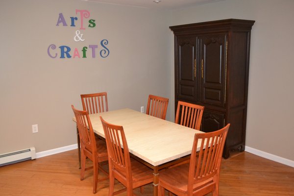 Arts and Crafts, Working on a Puzzle, playing Cards or Board Games.  Separate from dining area so the activity can be left undisturbed until mealtime is over.  