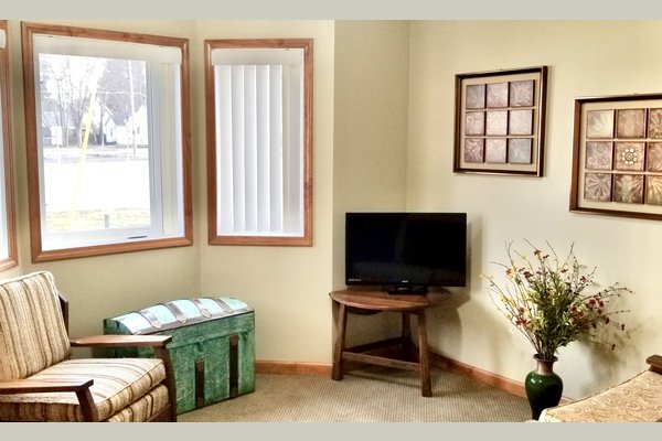 We have two apartment sizes, the smaller "cozy" rooms are around 300 square feet and the larger "Comfort Suite" is approximately 400 square feet.