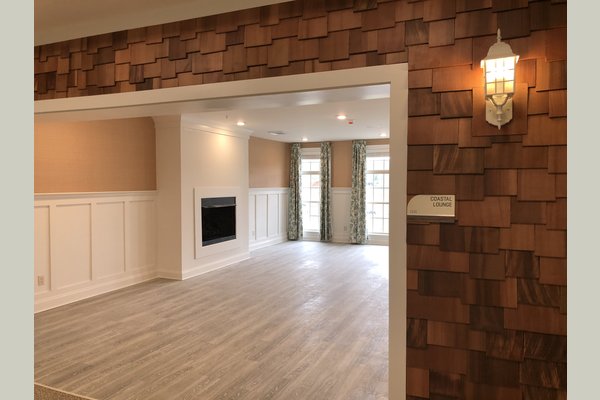 The sunroom is located on our Coastal Cove wing and provides an inviting space to relax in the sunshine.