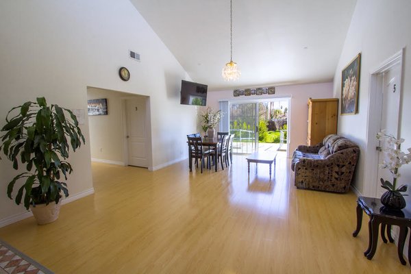 This room is the everyday TV room, lounge room, living room. 