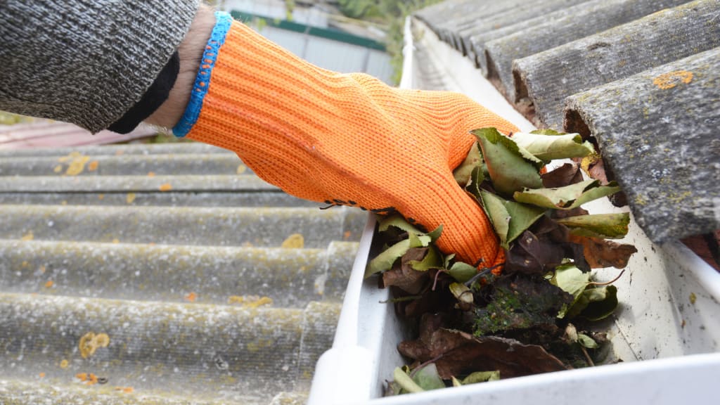 Gutter cleaning and window washing are part of how to winterize a vacation home