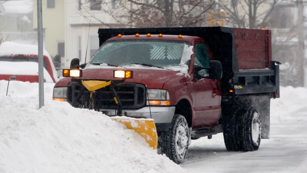 Add snow plowing to your winter home checklist for Hamptons winter home preparations