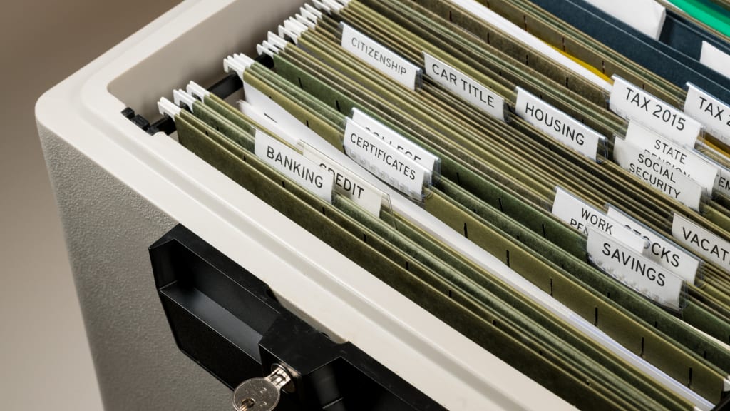 an organized filing cabinet thanks to tips on home organization