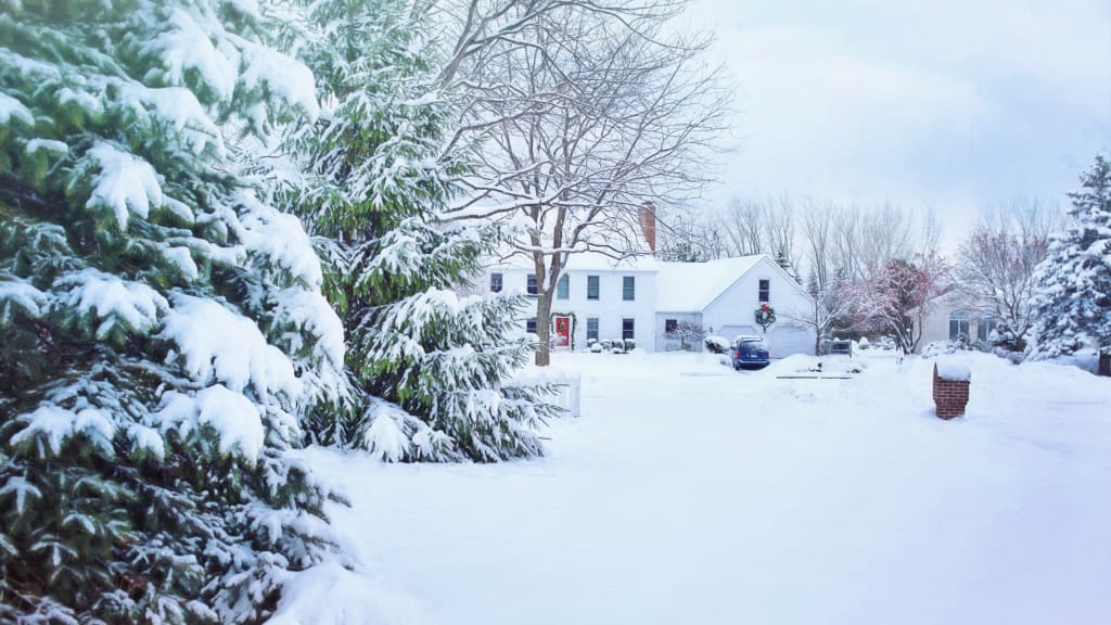 A winter home in the snow, with lots of things on its winter home maintenance list