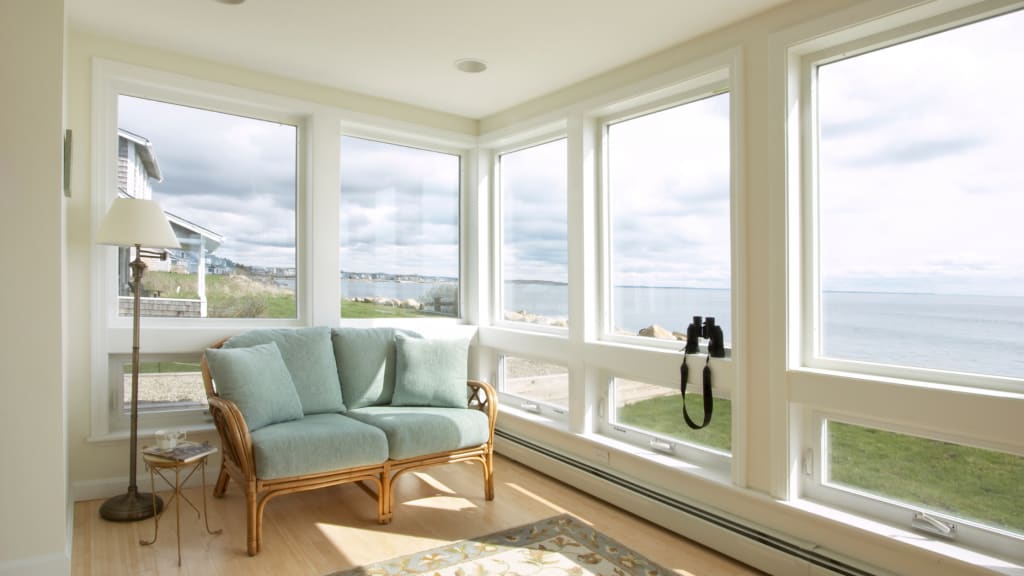 A beach house living room is pictured after its owners learned how to dewinterize a house