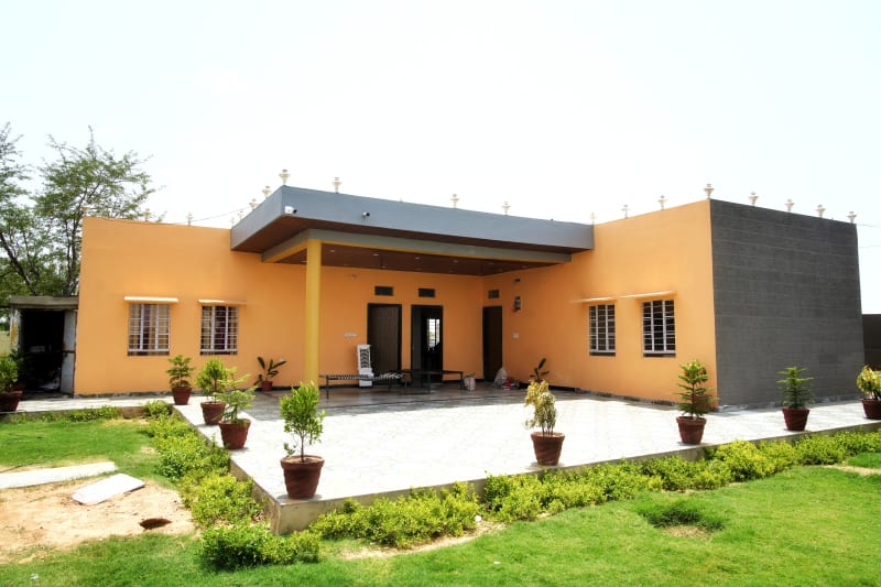 Premium luxury bedroom at Sand Dunes Stay Jaipur farmhouse