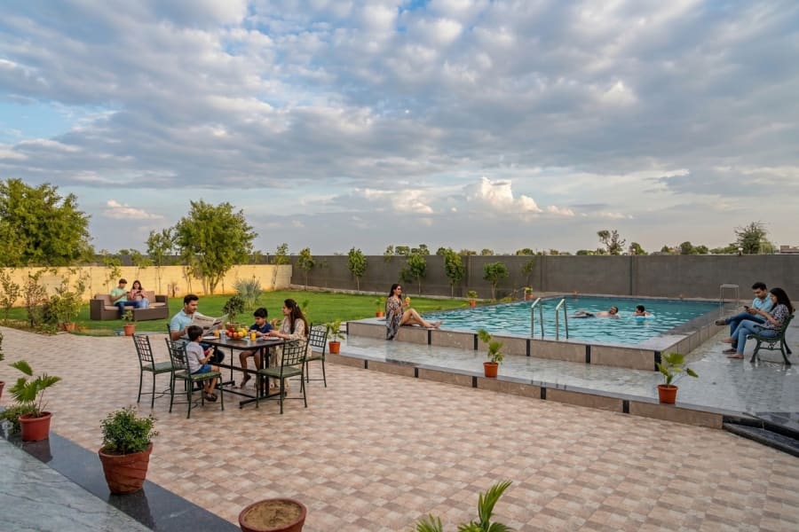 Deluxe room at Sand Dunes Stay — private pool villa Jaipur with AC and attached bathroom