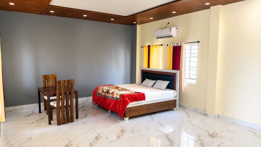 Outdoor dining and garden at Sand Dunes Stay — private pool villa Bagru Jaipur