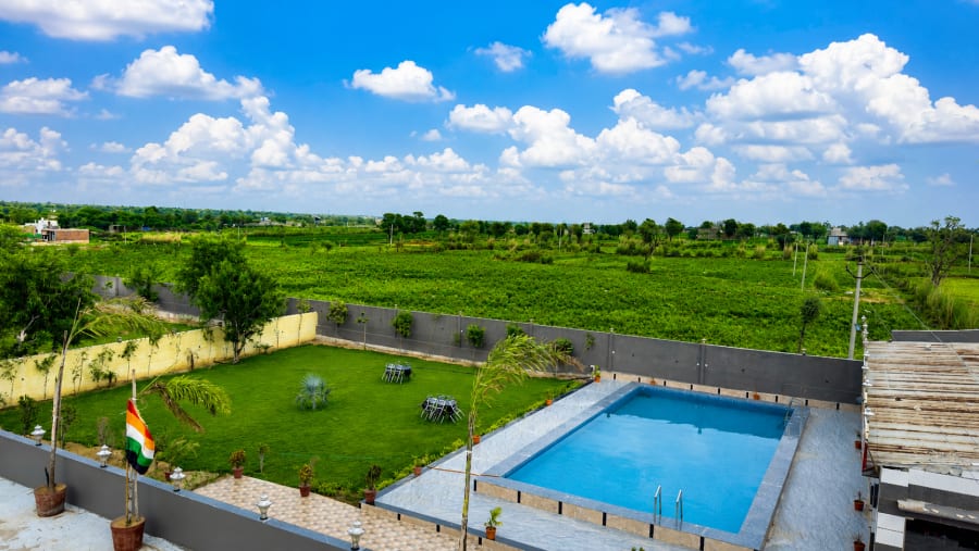 Pool and outdoor party area at Sand Dunes Stay — pool villa for group Jaipur