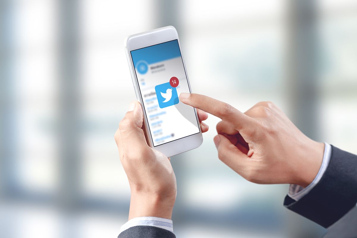 assistant using phone for tweeting social media virtual assistant