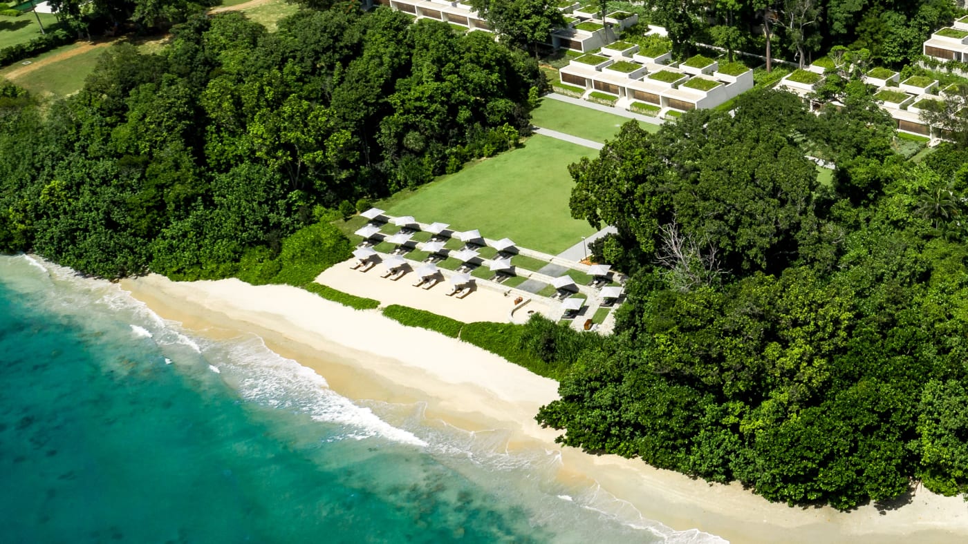 Aerial view of the beach and suites of the Mandarin Oriental, Desaru Coast, between tropical forest and the South China Sea