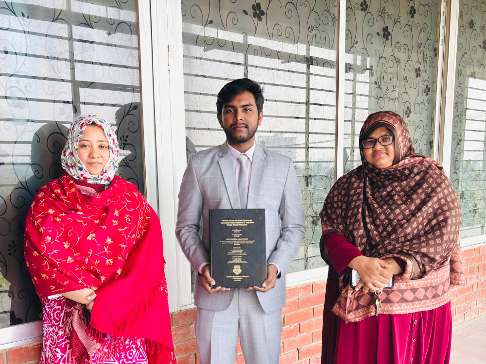 Nazmul Huda Badhon with faculty members after completing his undergraduate thesis